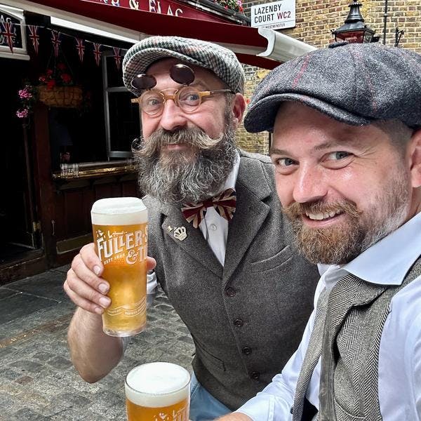 Jack and James enjoying a pint of Fullers London Pride ale at the Lamb & Flag Covent Garden