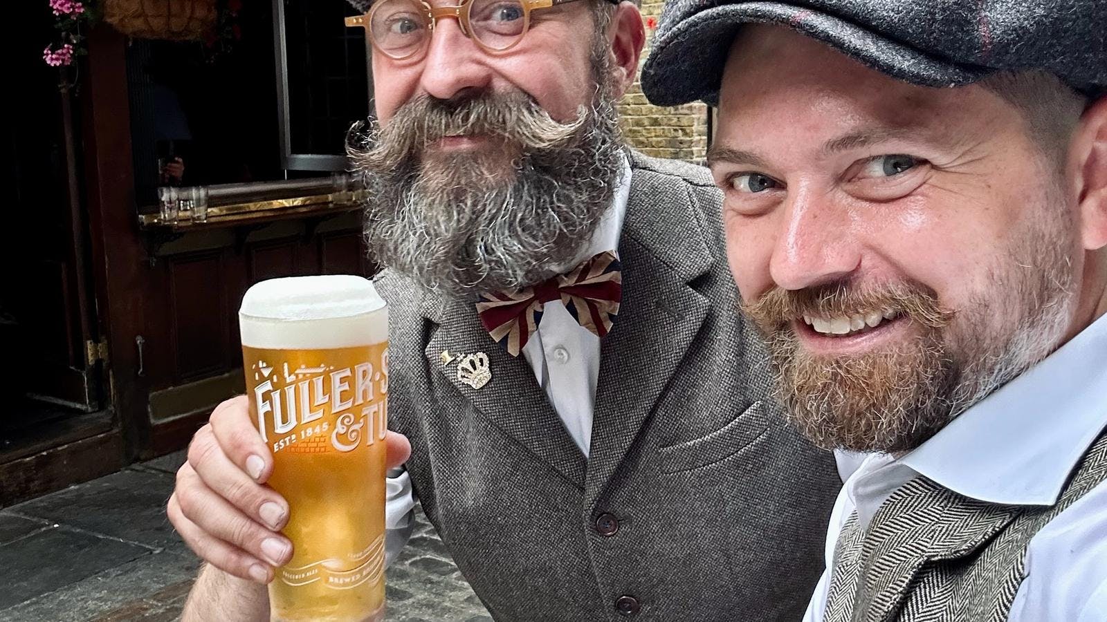 Jack and James enjoying a pint of Fullers London Pride ale at the Lamb & Flag Covent Garden